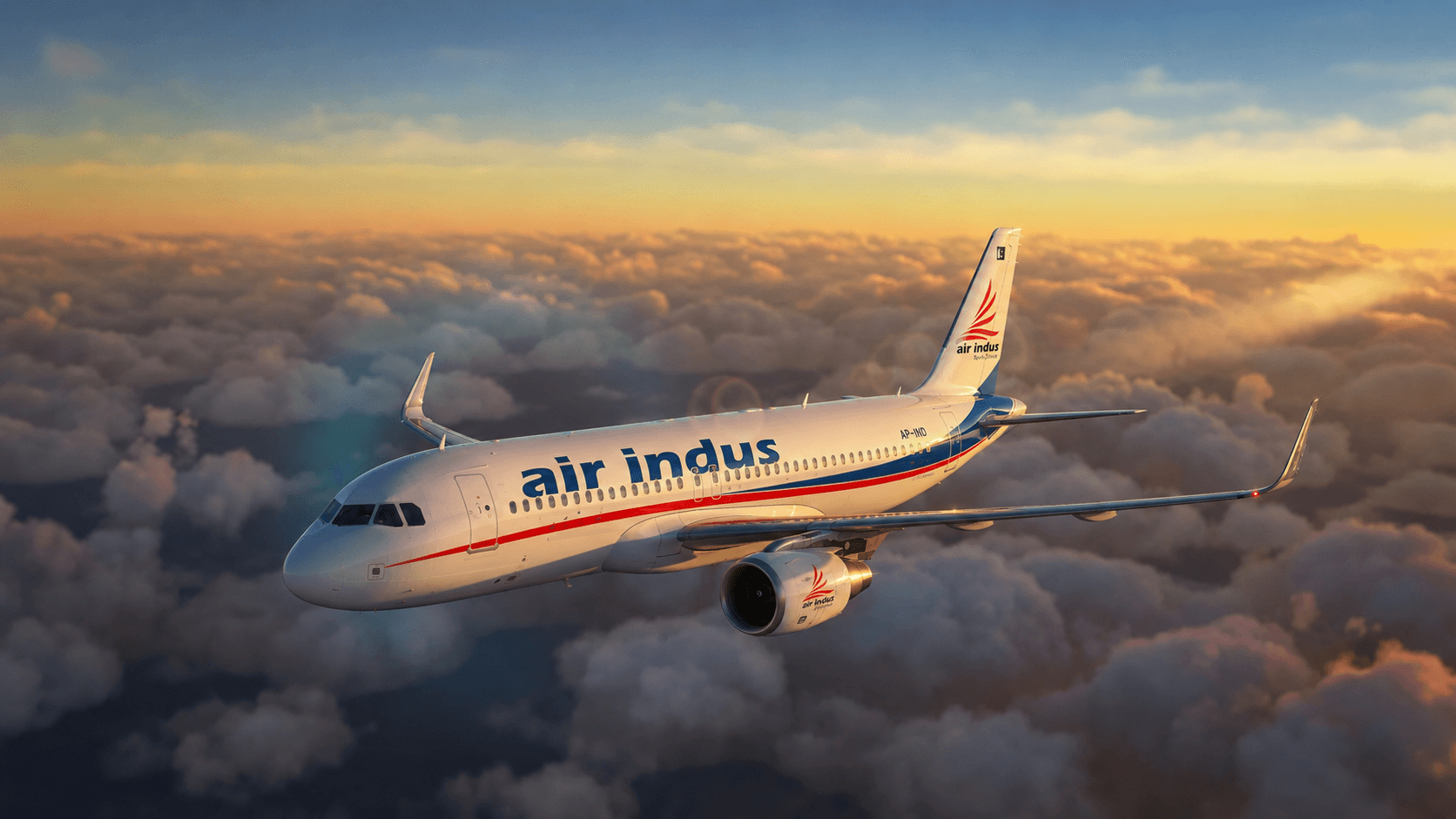 An Air Indus aircraft cruising above the clouds at sunset